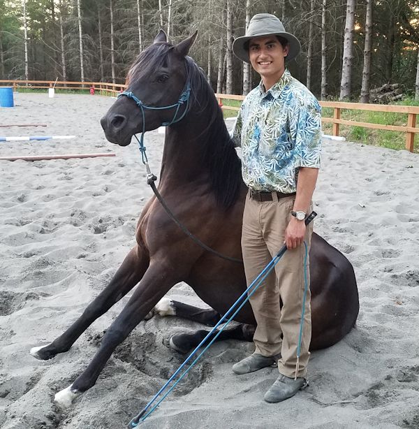 Austin with his Arabian horse Kasino